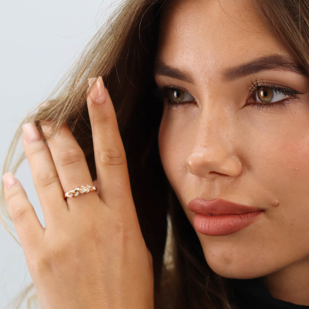 rose gold allring Close-up of adjustable ring showing olive leaf design and sparkling crystals, perfect for gifting or stackable styling