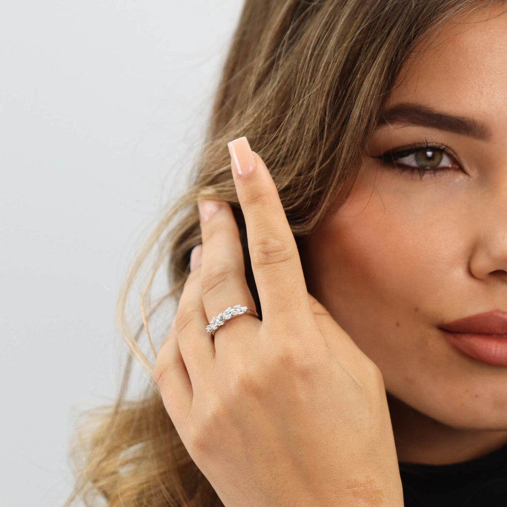 Close-up of Allring white gold adjustable ring showing olive leaf design and sparkling crystals, perfect for gifting or stackable styling