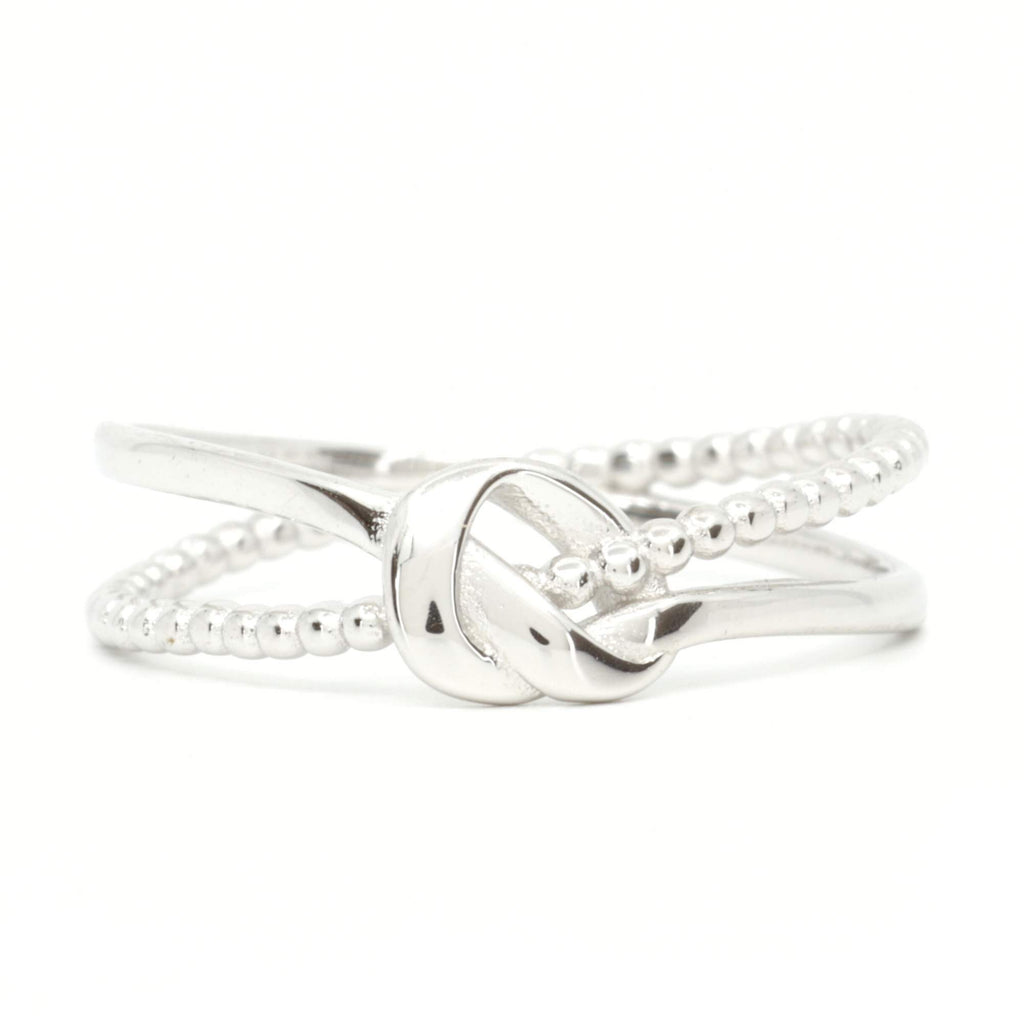 Close-up of Satinski Dainty Adjustable Open Knot Ring in sterling silver with delicate beaded detail.
