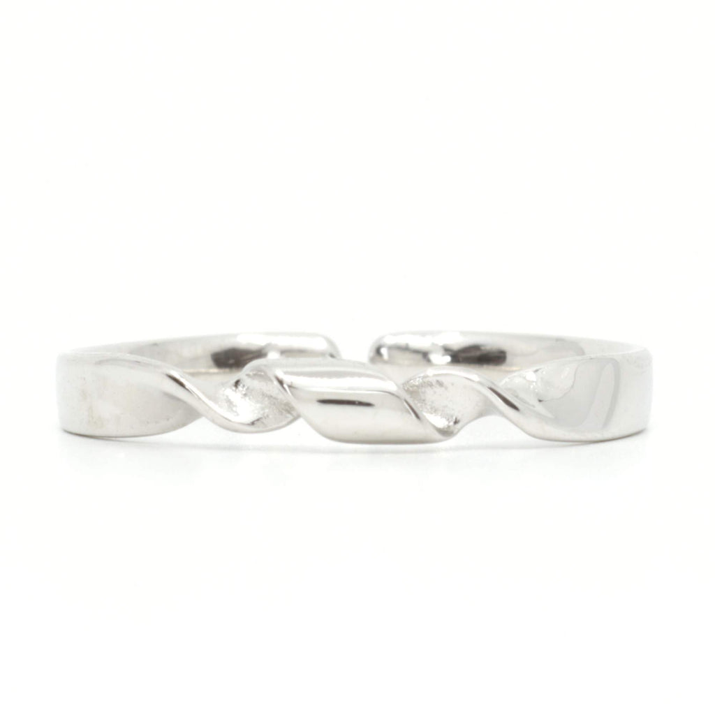 open adjustable twist Silver ring by Satinski with a wavy design on a white background