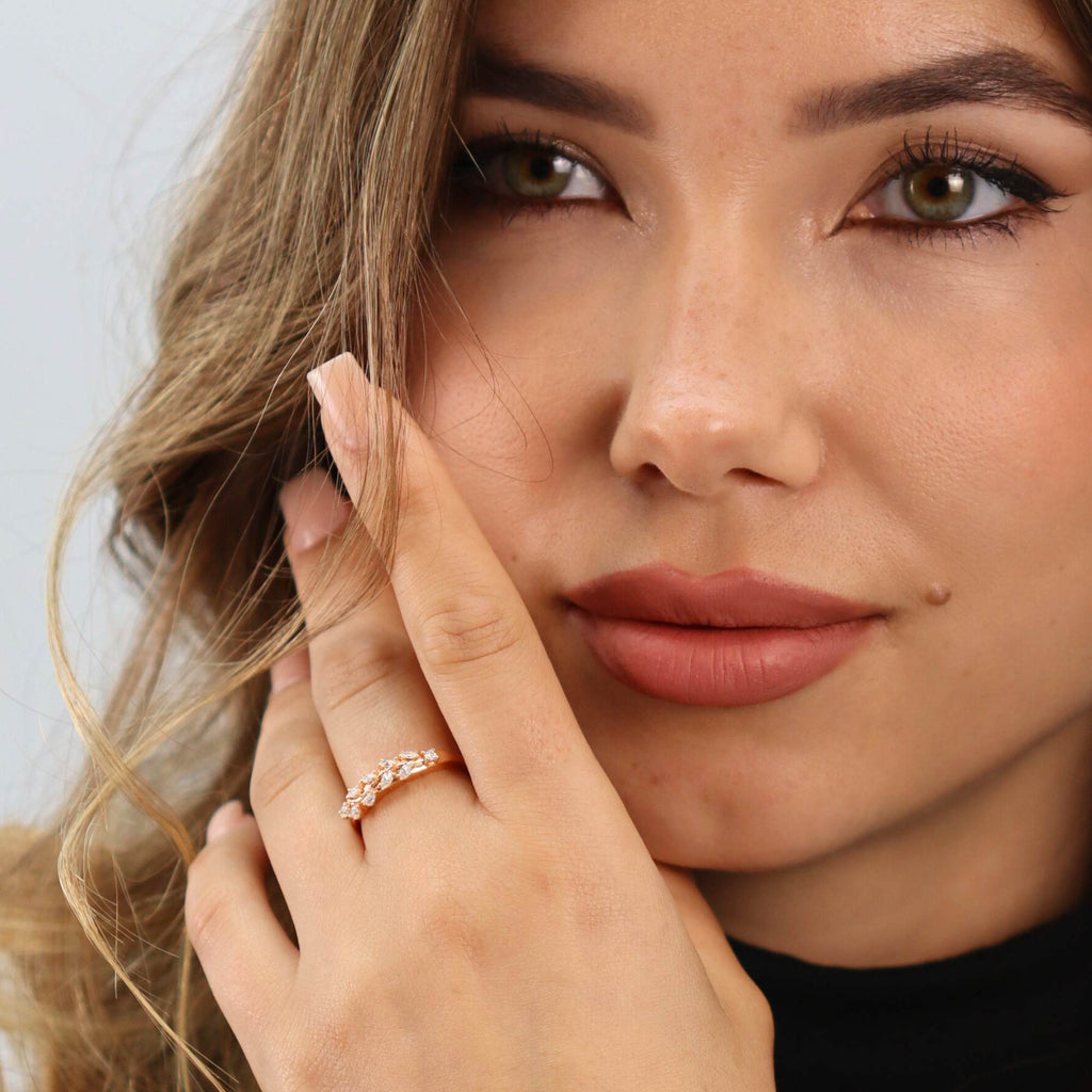 rose gold Allring adjustable olive leaf ring worn on finger, showcasing resizable fit for women with arthritis or swelling