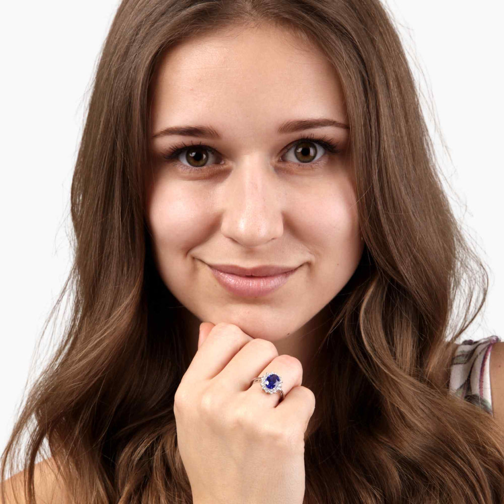 Satinski silver blue topaz flower ring